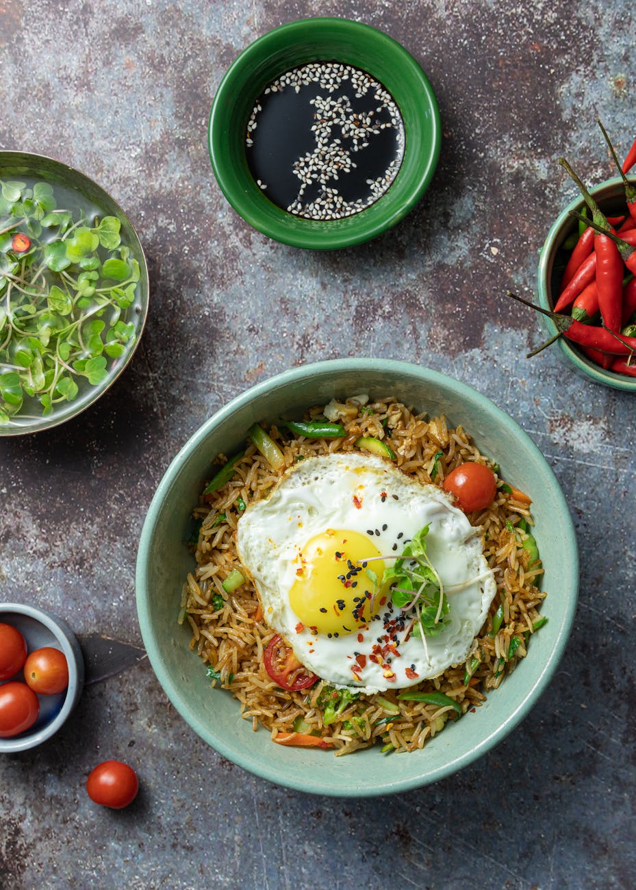 Simple egg fried rice with scallions in a bowl