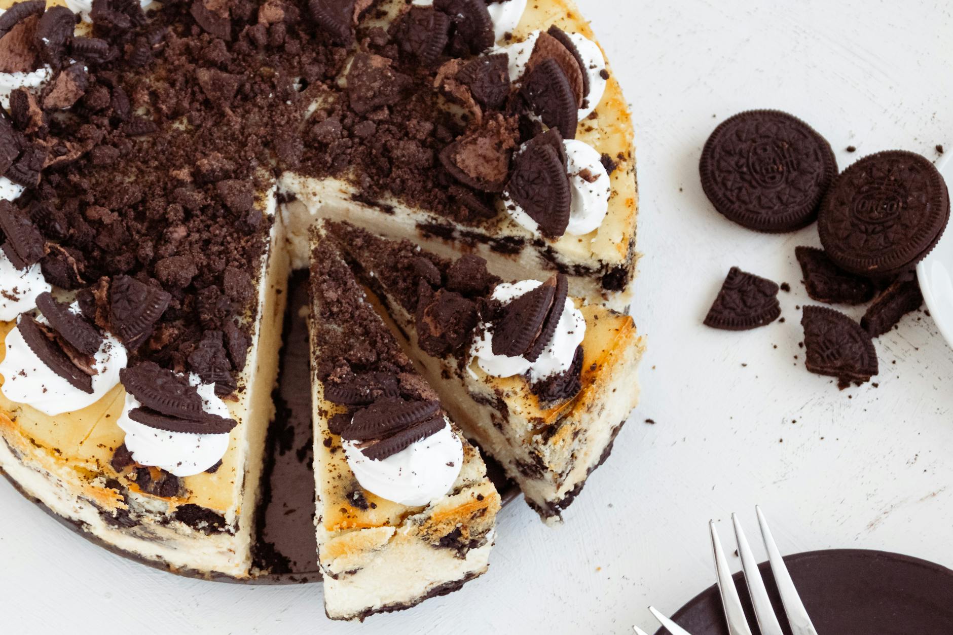 No-bake Oreo cheesecake slice with cookie crumbs on top