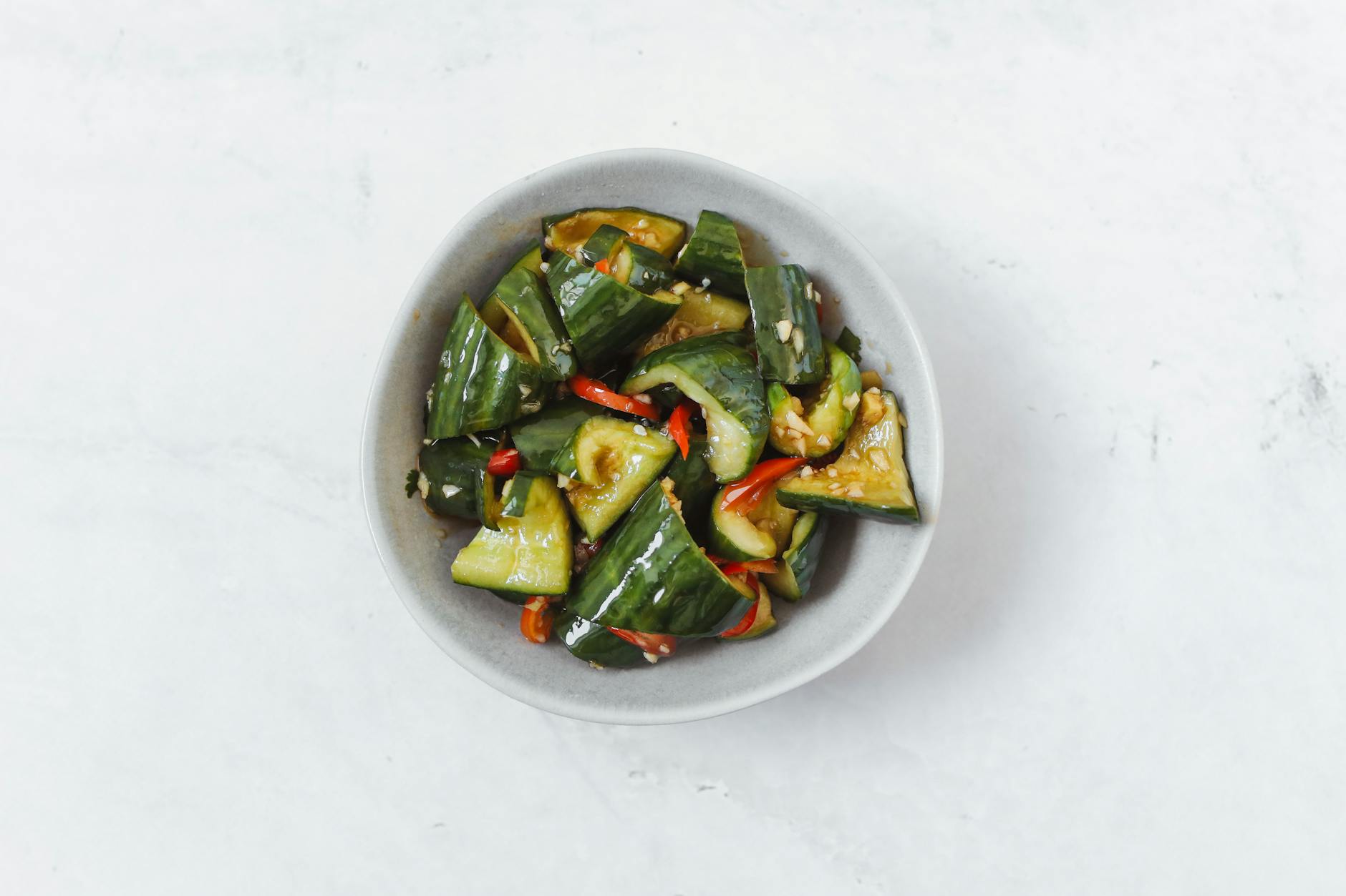 Smashed cucumber salad with chili crisp and sesame seeds