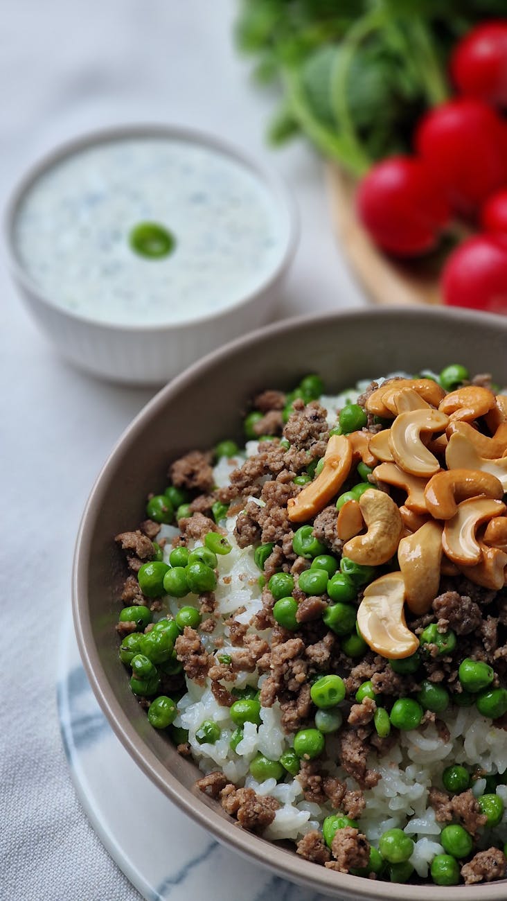 Beef and rice dish with vegetables in a bowl