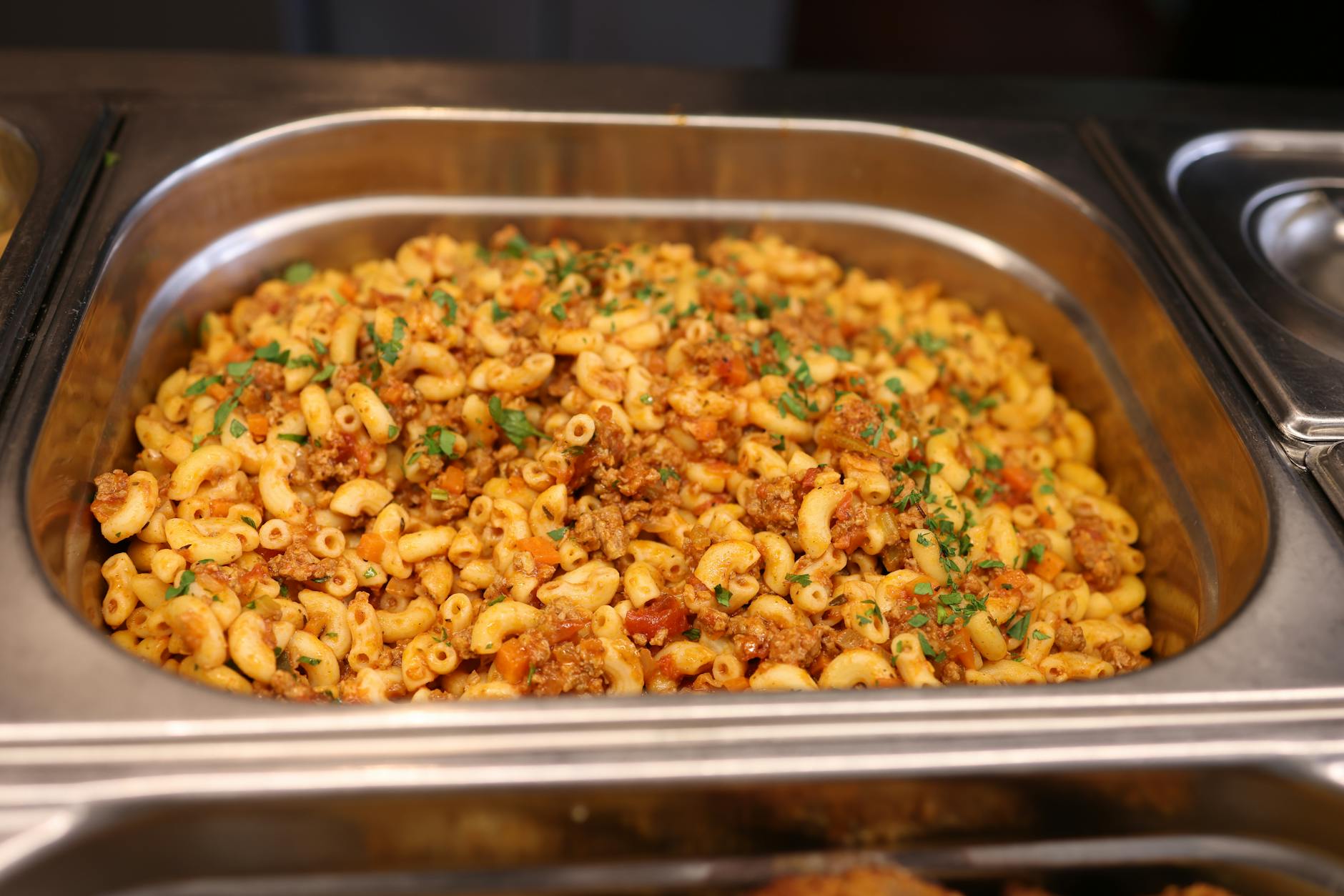Cheesy taco pasta skillet with ground beef and melted cheese