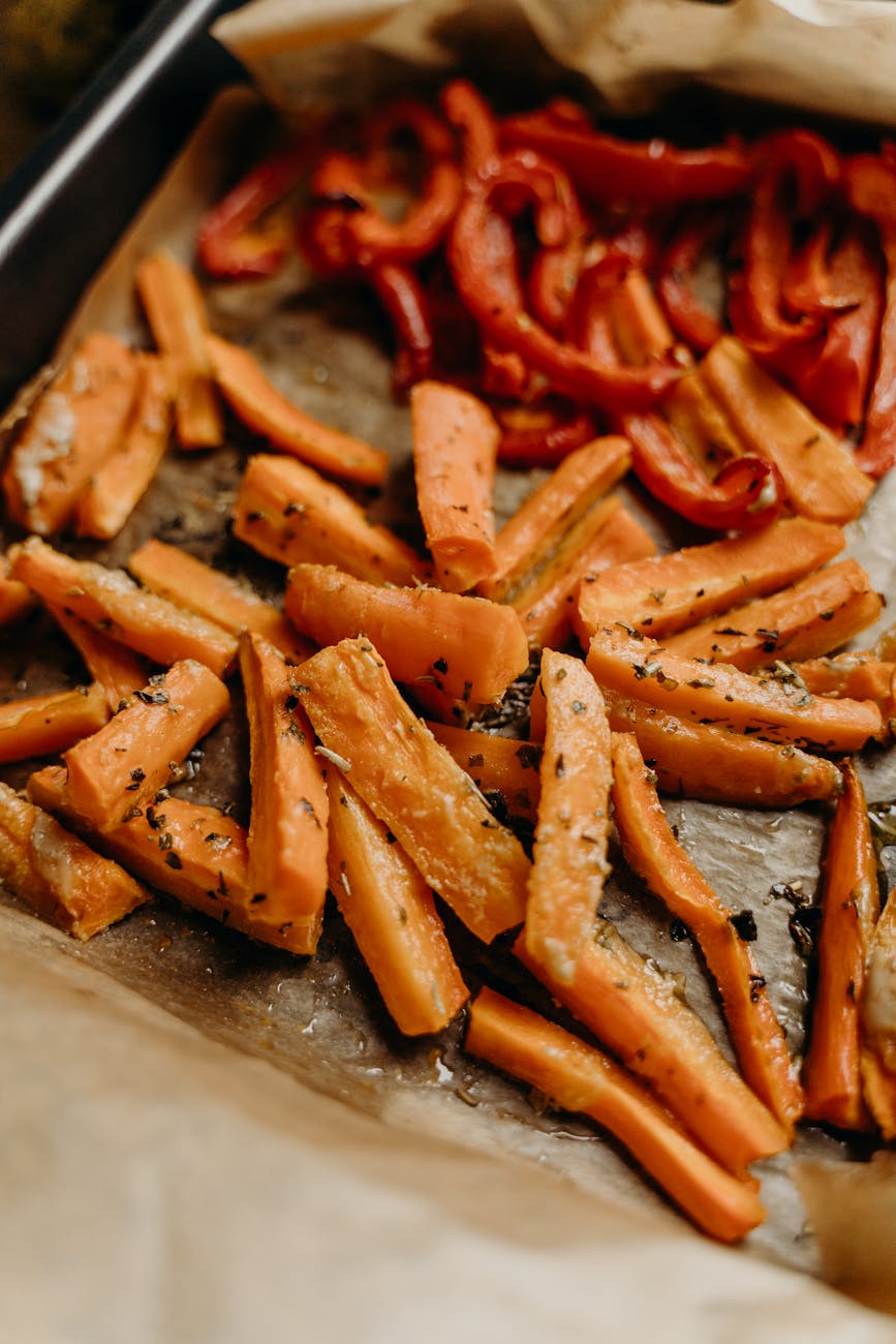 Roasted sausage and colorful vegetables on a sheet pan